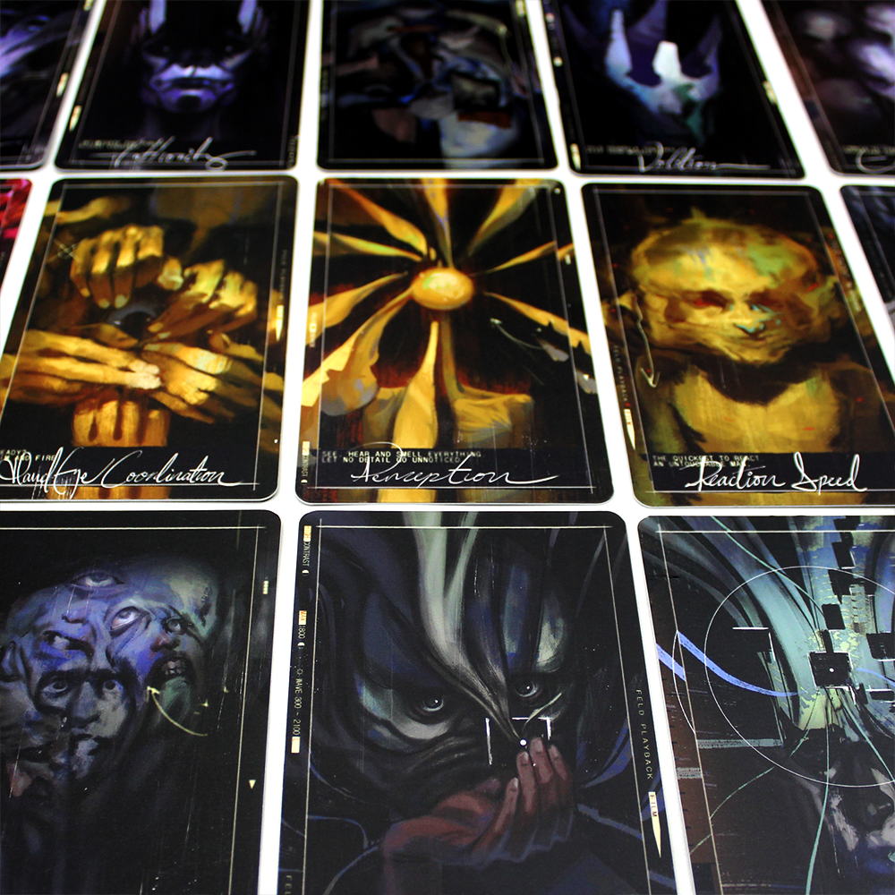 Collection of dark, mystical-looking tarot or oracle cards with surreal imagery.